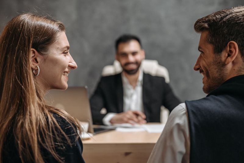 A consultant meeting with clients